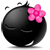 Emoticon Blacky flor na cabeça
